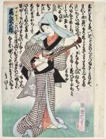 Geisha con un raffinato kimono che suona il tradizionale e antico shamisen...